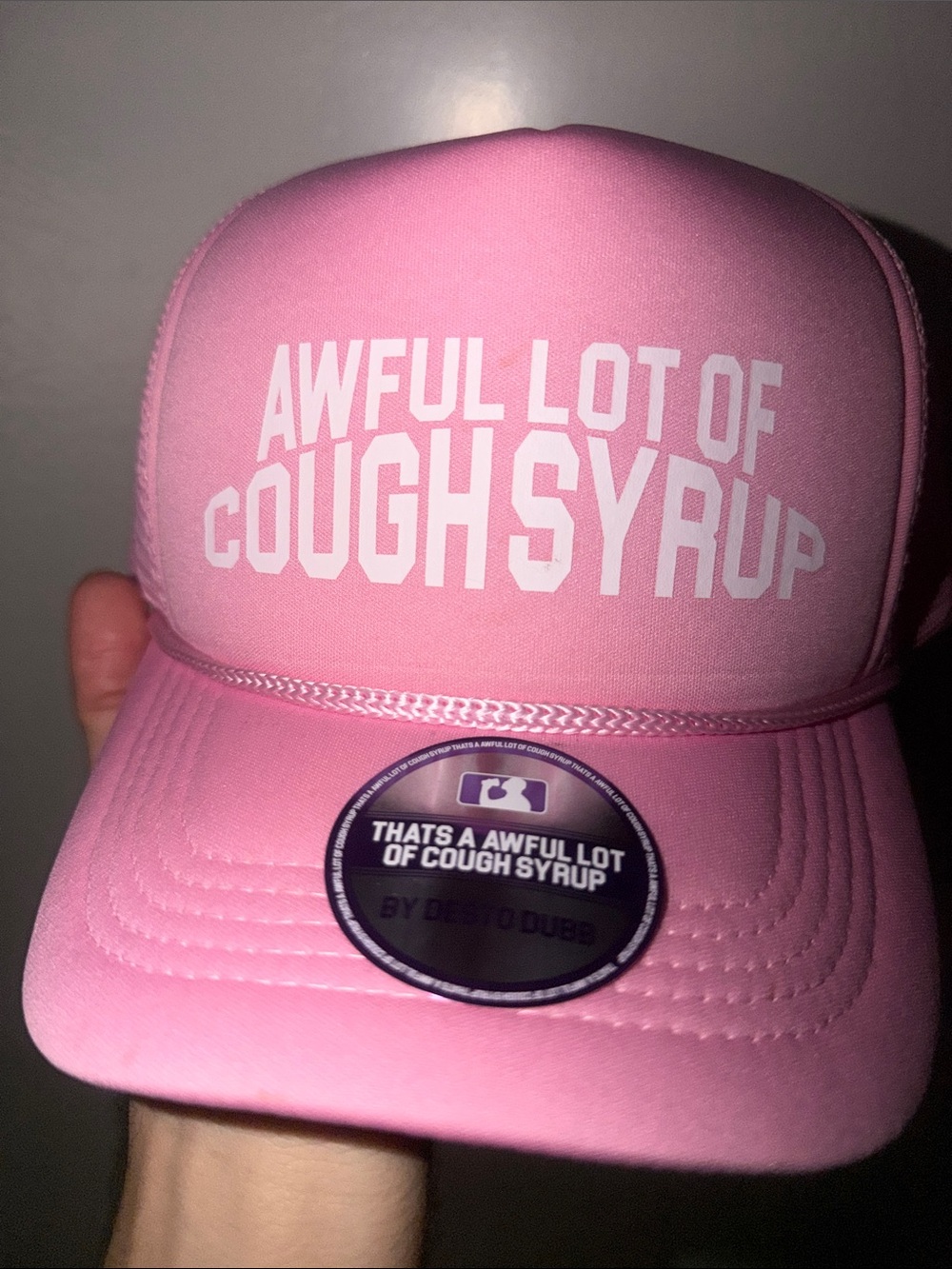 Pink Snapback Trucker Hat with 'Awful Lot of Cough Syrup' White Text